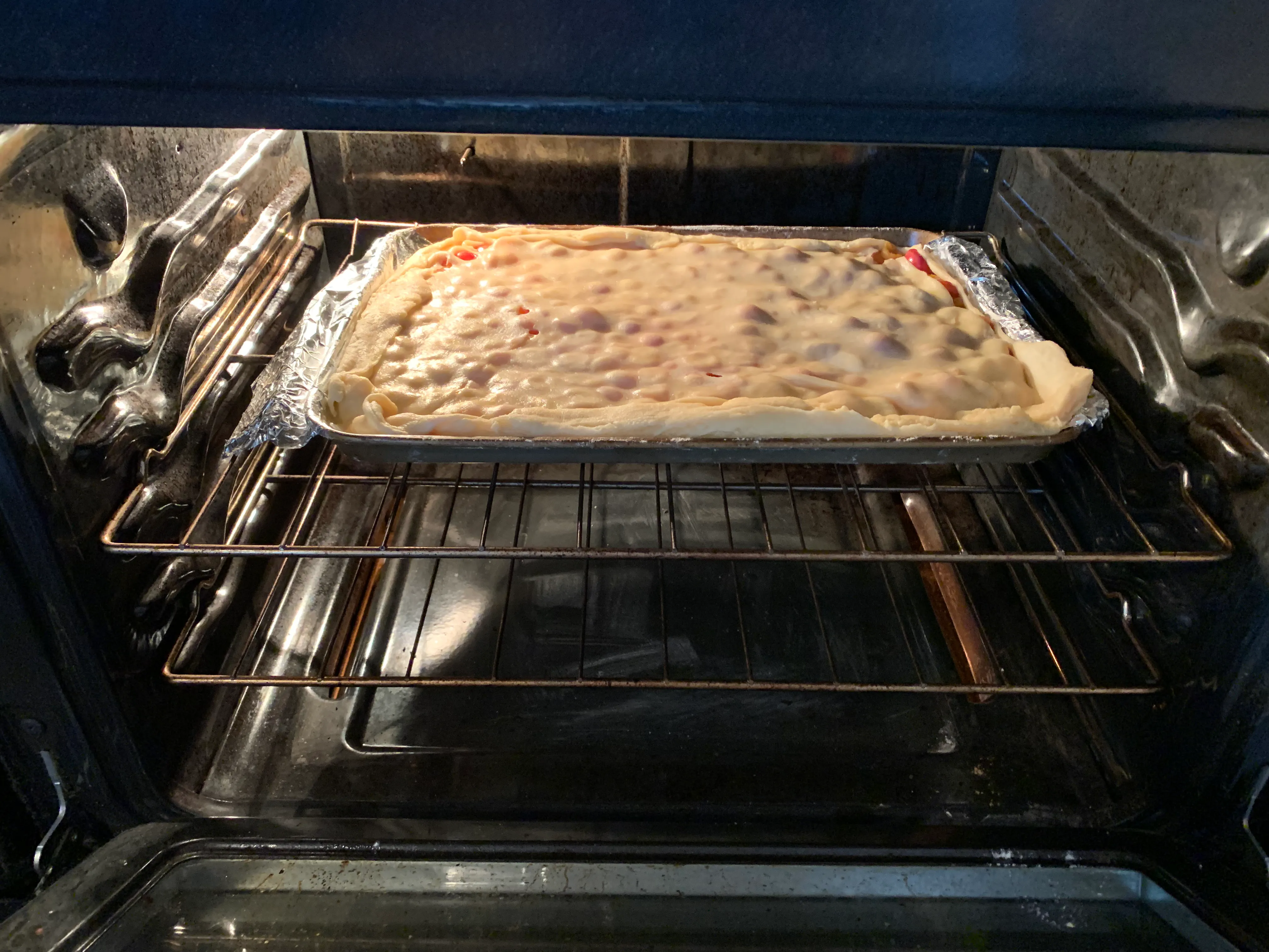 Cherry slab pie in the oven